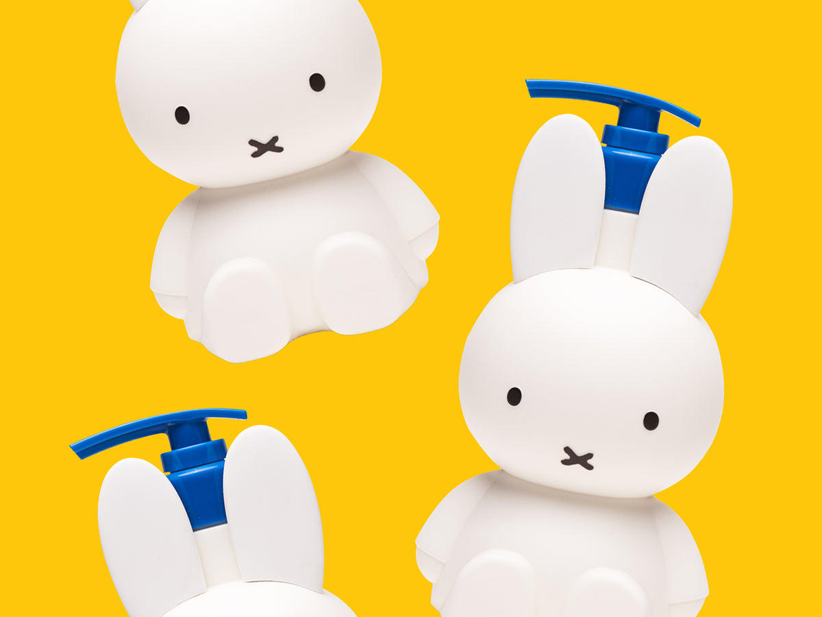 Miffy Flower Garden body lotion and shower gel on a yellow background