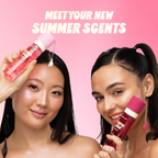 Tropic Lush Body Mist — models holding Cloud Kiss and Tropic Lush body mists