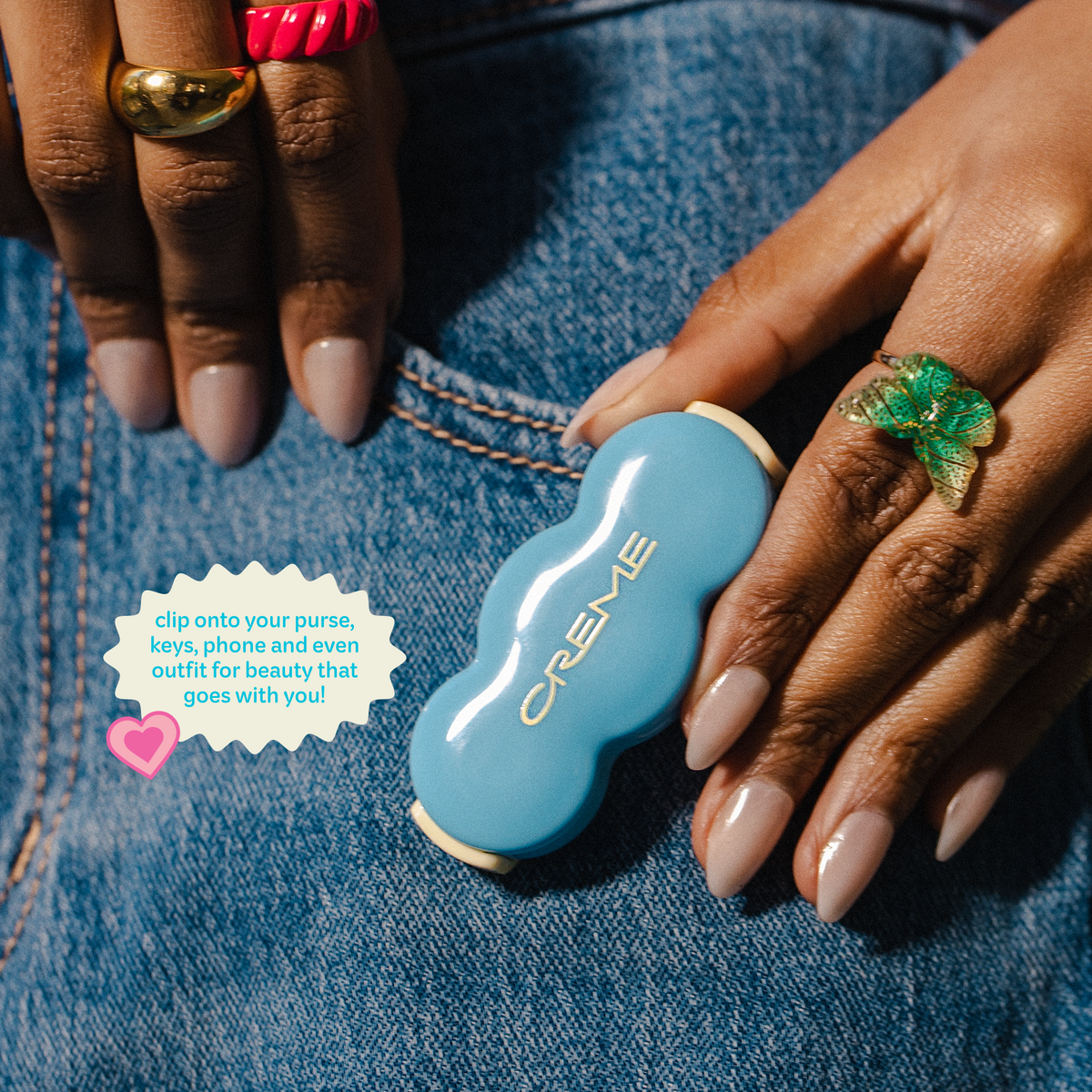 Shimmer Pop Clip-On Lip Gloss — blue gloss compact clipped to jeans