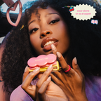 Shimmer Pop Clip-On Lip Gloss — model applying gloss with her fingertip