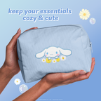 Cinnamoroll Dream Daisy Makeup Bag — hands holding the blue Cinnamoroll makeup bag